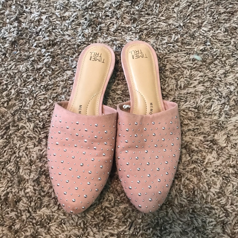 Studded backless ballet flats.